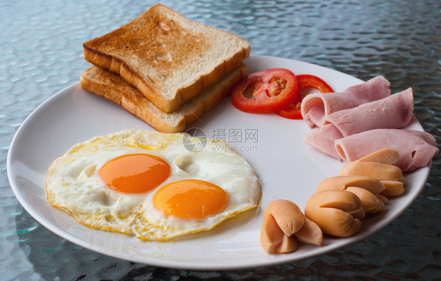 早餐浆果橙子勺子饮料圆形食物烹饪面包盘子香肠图片