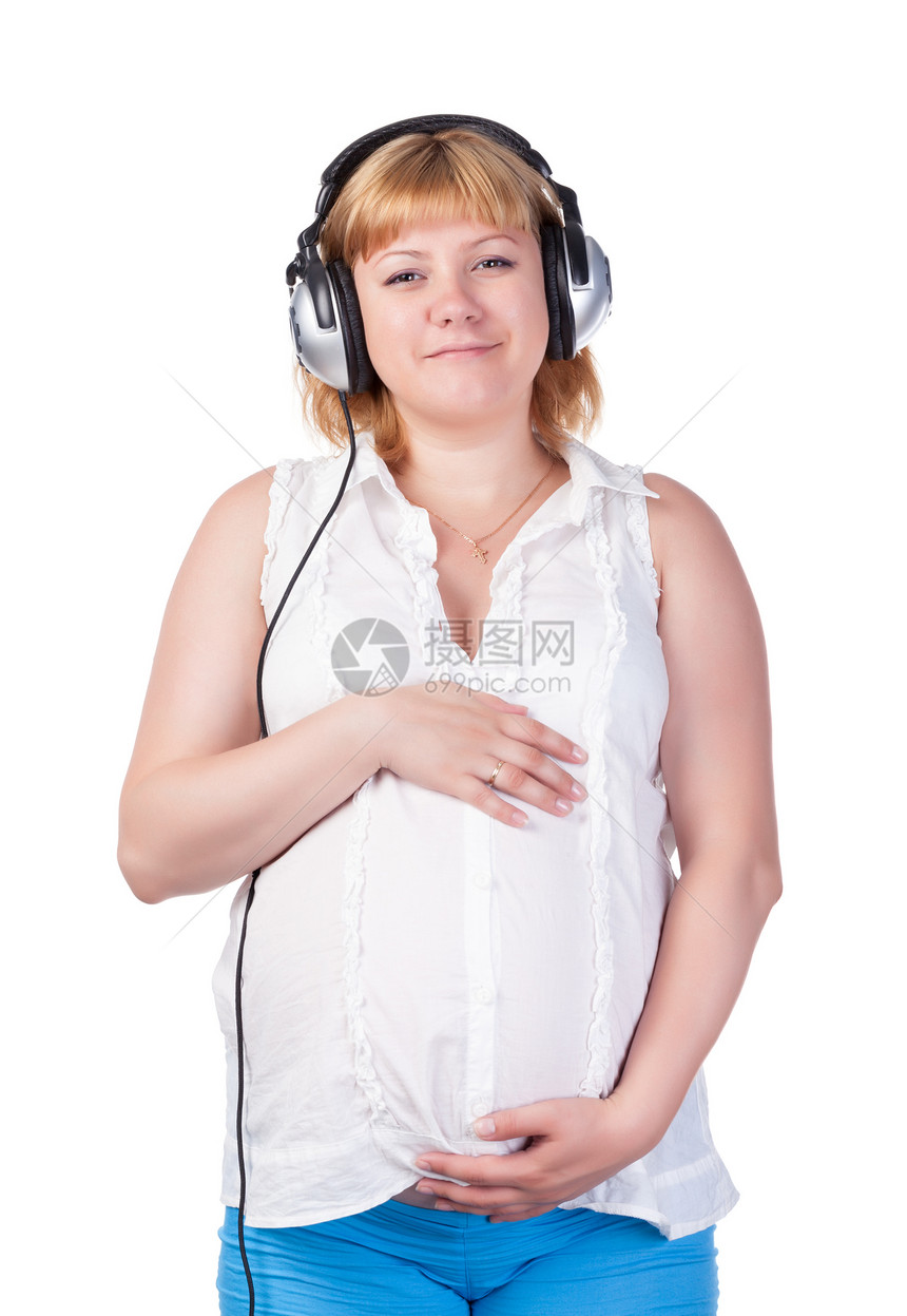 带耳机的孕妇肚子药品生活概念产妇婴儿父母音乐怀孕女士图片