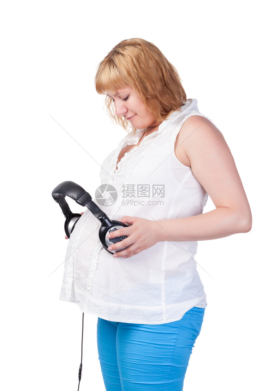 带耳机的孕妇女性婴儿概念肚子产妇音乐女性化母亲腹部女士图片