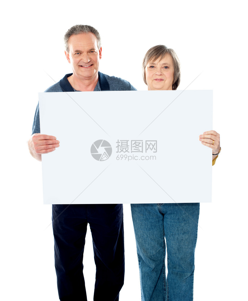 丈夫和妻子展示广告板的广告牌图片