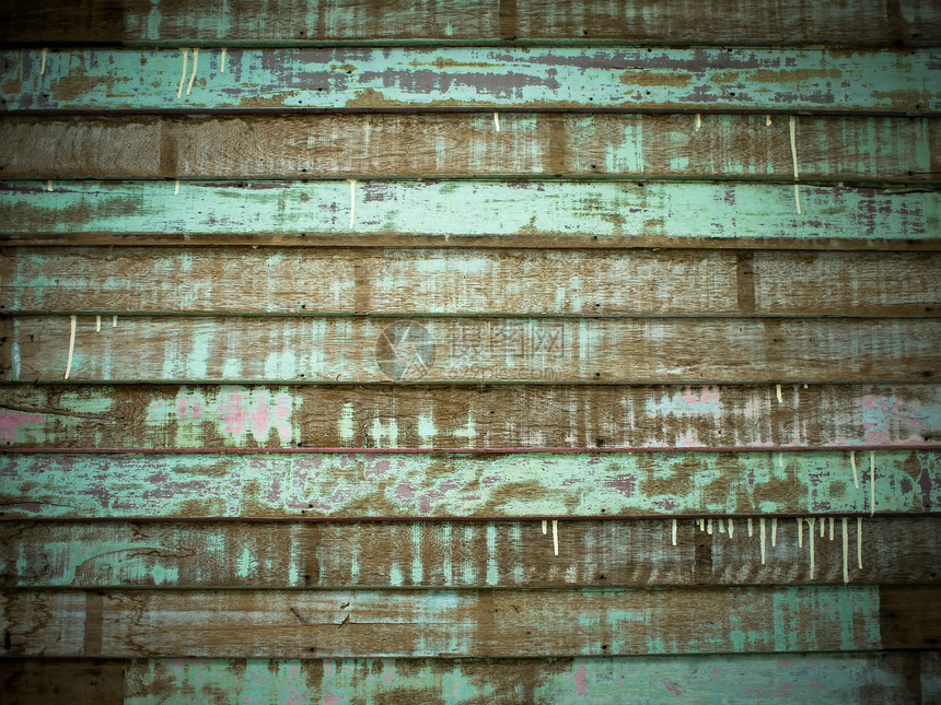 绿色的老碎木板板墙图片
