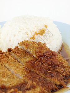 大米和炒猪肉餐厅烹饪盘子油炸食物美食筷子午餐白色背景图片