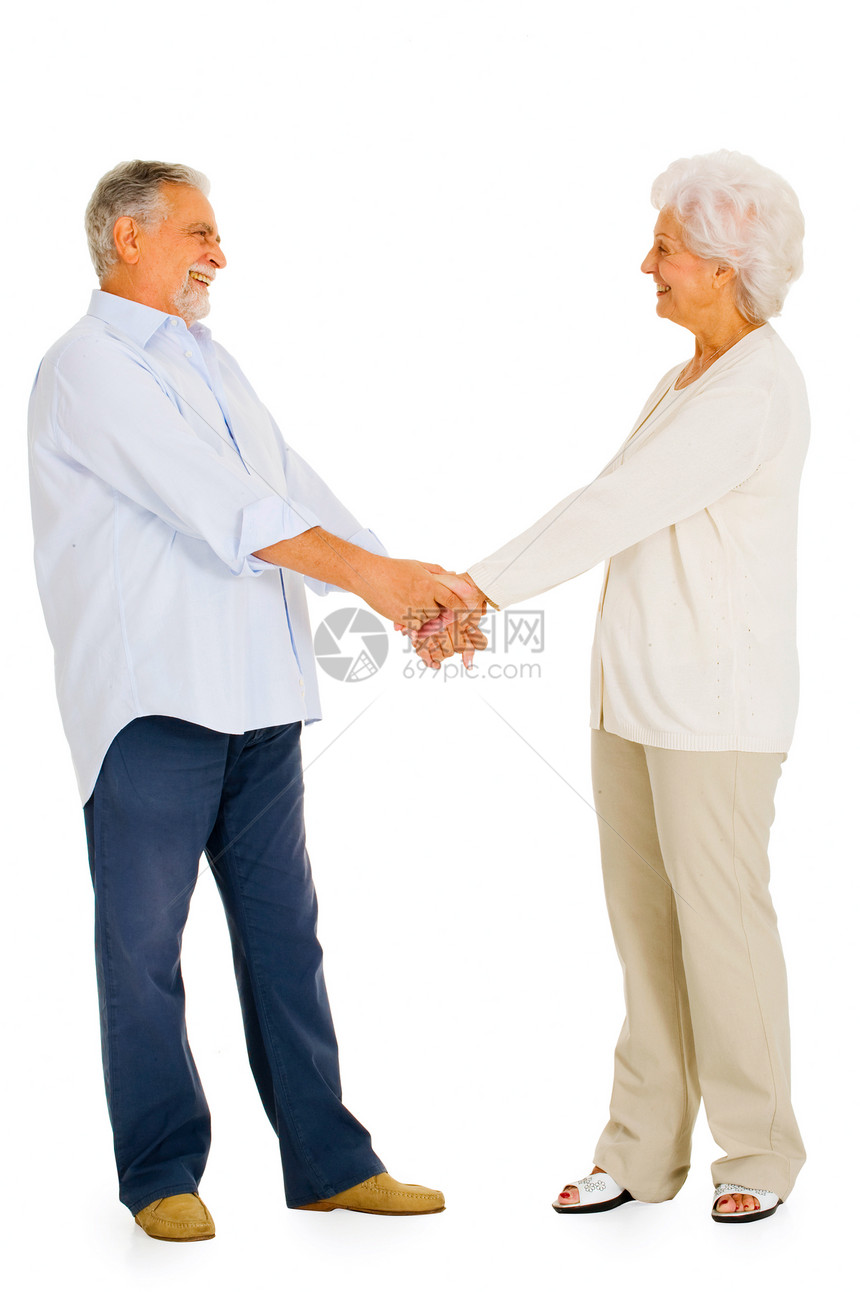 一对快乐的老夫妇的肖像成年人男人夫妻眼神老年牛仔裤女士白色休闲装胡须图片