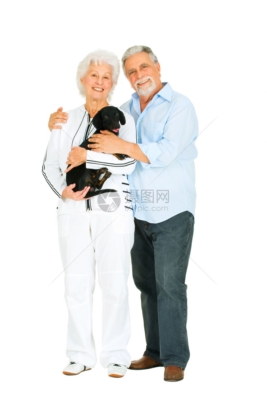 年老的夫妇 带便当的动物老年男人微笑胡须休闲装成年人牛仔裤白色女士图片
