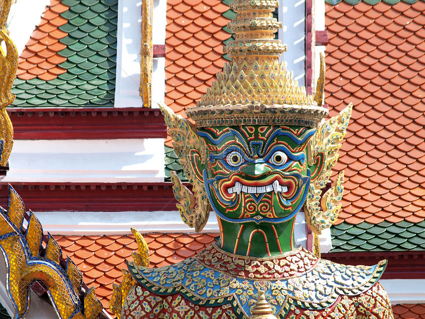 泰国曼谷大宫的泰国恶魔Thai demon建筑学连体宗教情调佛塔金子文化精神旅行寺庙图片