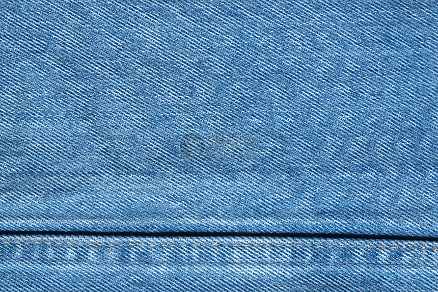 蓝色牛仔裤纹理 背景牛仔布裤子服饰服装接缝白色织物标签材料宏观图片