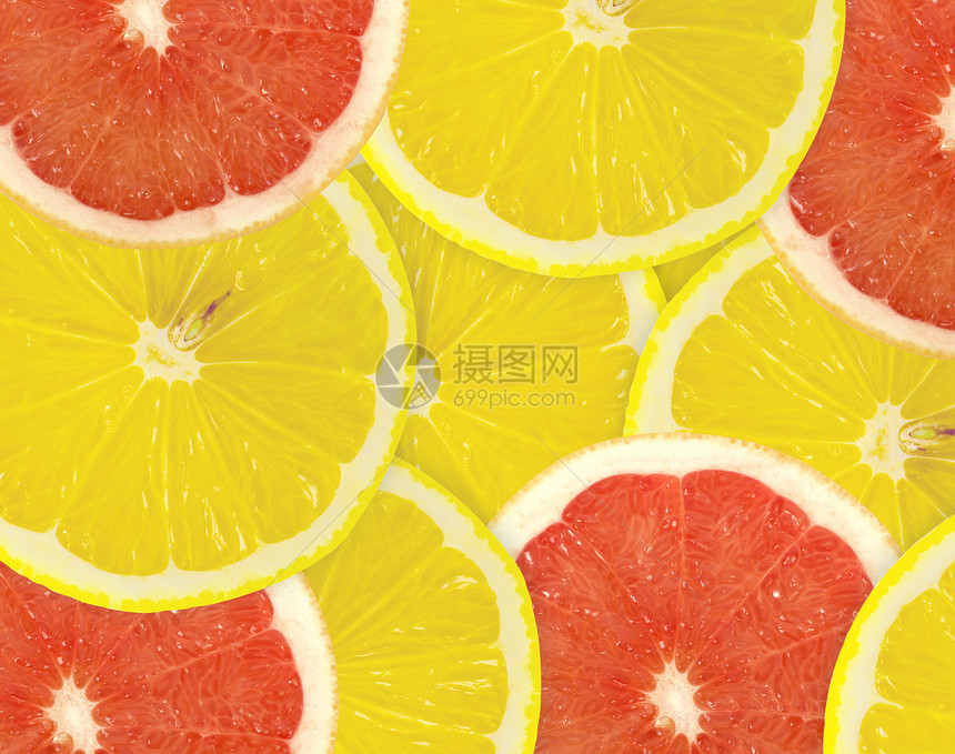 柑橘切片摘要背景 特写 工作室照片食物柚子红色宏观黄色肉质绿色活力柠檬摄影图片