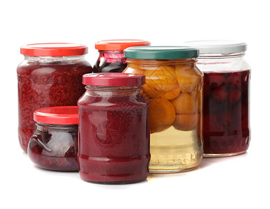 甜食保护区桃子蜜饯食品宏观玻璃水果红色浆果用具甜点高清图片