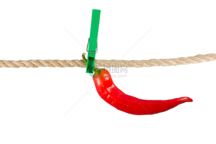 红色胡椒红辣椒在衣用绳索上图片