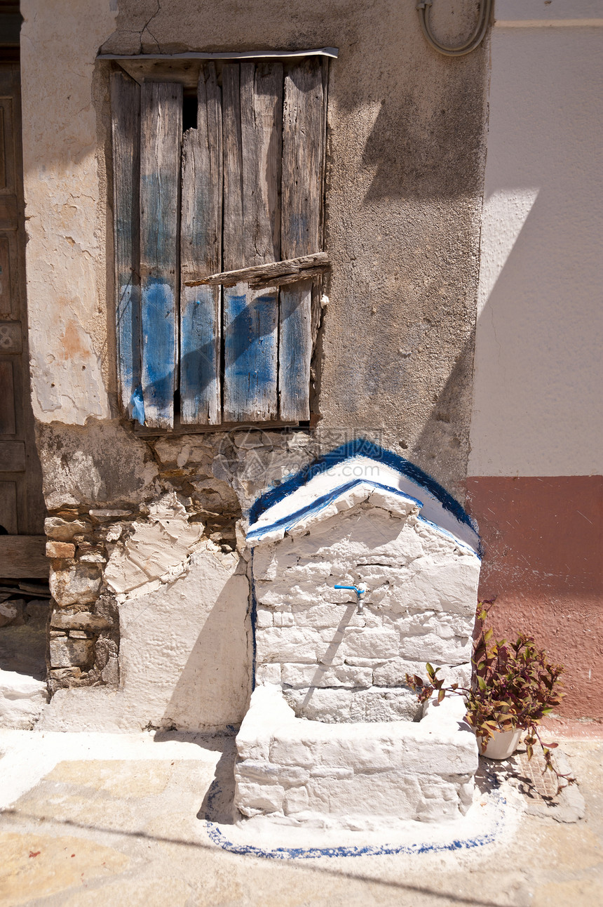 Samos的建筑物花园牧歌喷泉城市蓝色窗户建筑山村废墟植物图片