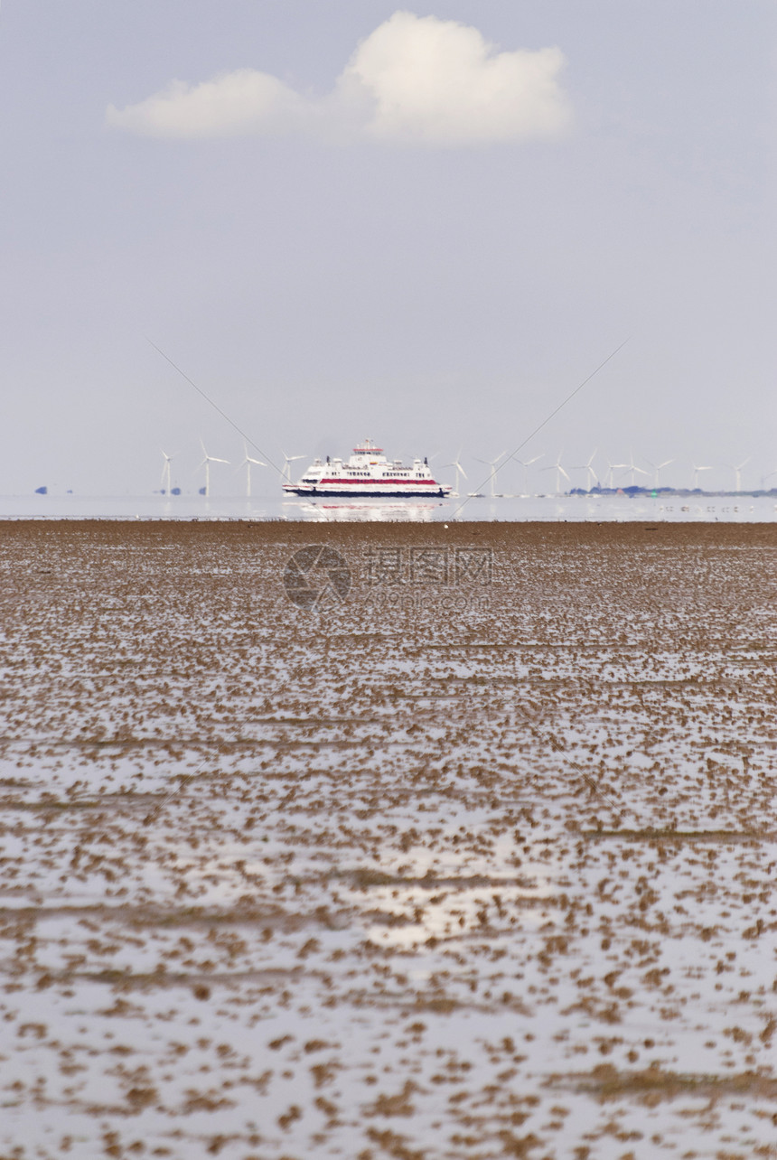 德国沃登海 霍尔姆奥兰发电机地平线牧歌海滩风轮岛屿泥滩汽船客船风力图片
