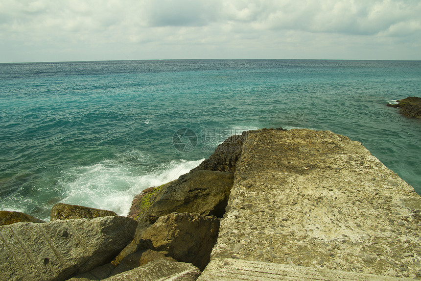 海支撑海岸反射日落旅行场景地平线自然海滩岩石图片