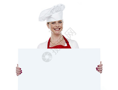 提出空白广告牌的成熟厨师背景图片