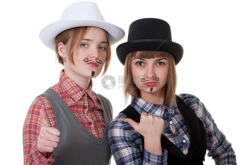 两名女孩涂有油漆的胡子女士帽子女孩们魅力青少年女性头发化妆品快乐黑色图片