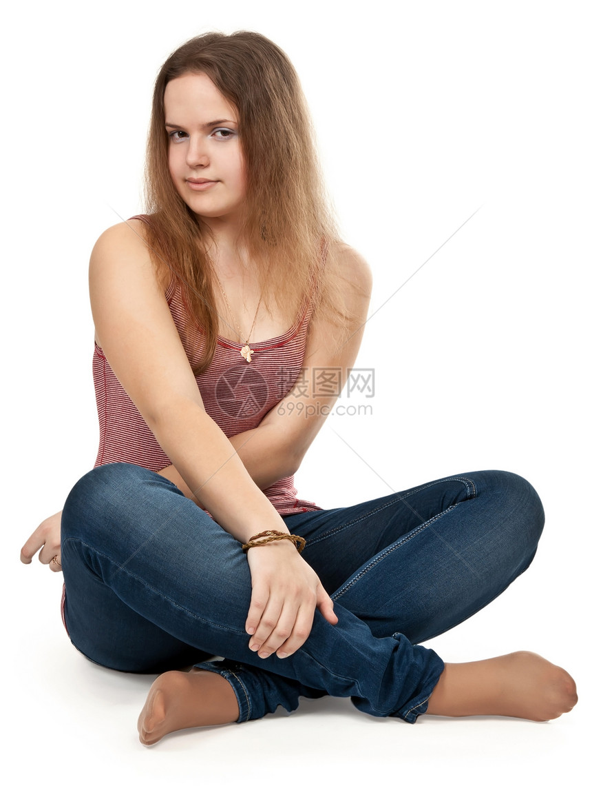 女孩坐在莲花的姿势上冥想女士女性闲暇健康生活白色图片