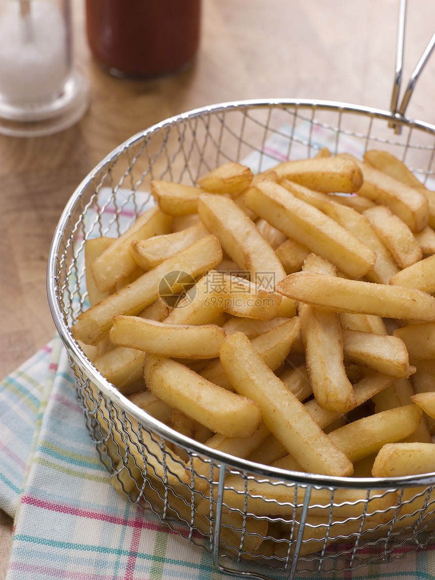 深碎篮子里的芯片筹码油炸食品烹饪食谱过滤器厨艺食物图片