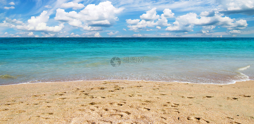 沙滩和热带海天空支撑冲浪阳光假期海浪放松天堂太阳海岸图片