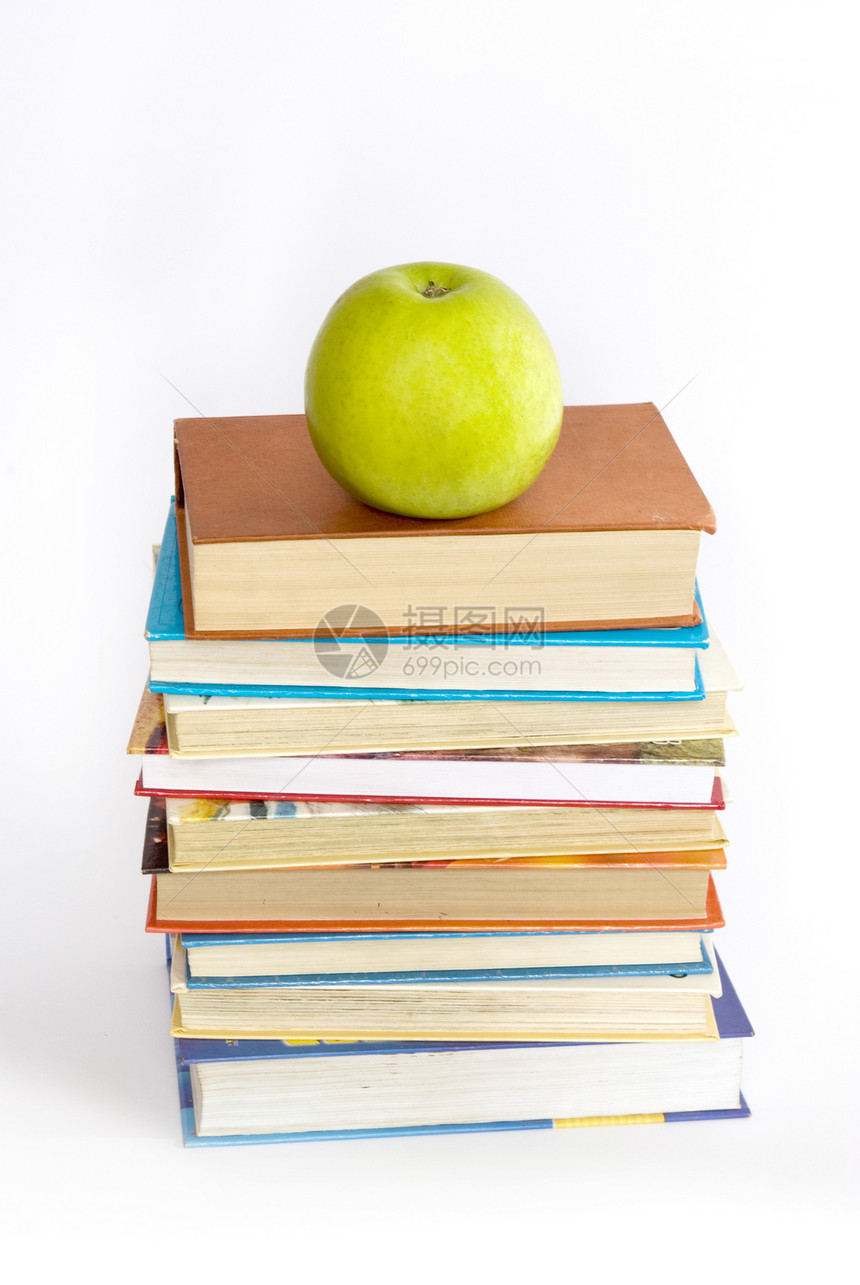 绿色苹果和书本图片