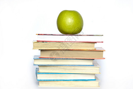 苹果和书本绿色生活白色生产水果学校教育图书背景图片