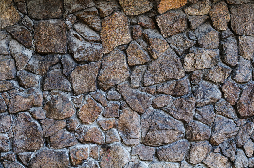 墙壁的岩石背景壁板石头建造水泥沉积力量巨石花岗岩棕色建筑图片
