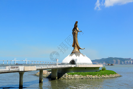 Kun Iam神像建筑场景雕像风景纪念碑雕刻半岛地标青铜地平线背景图片