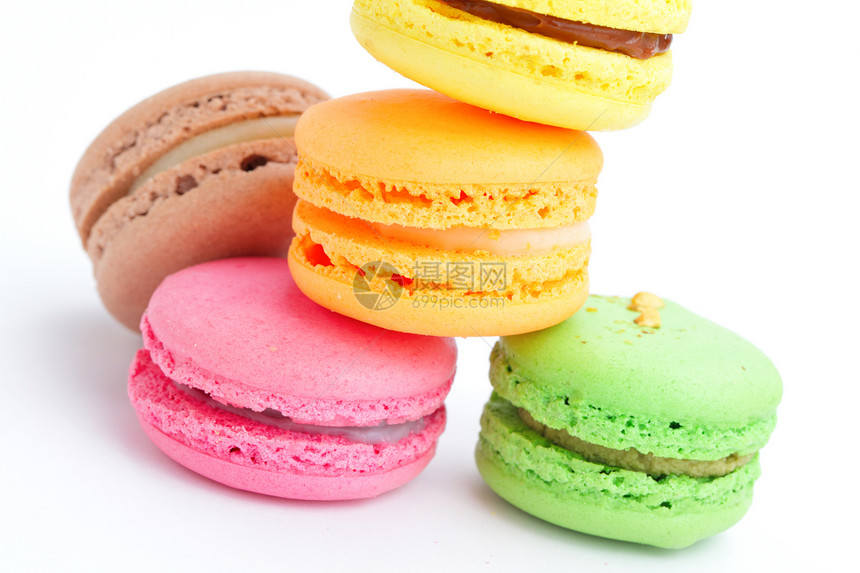 色彩多彩的马卡龙零食味道饼干红色橙子事业部紫色白色糖果蛋糕图片