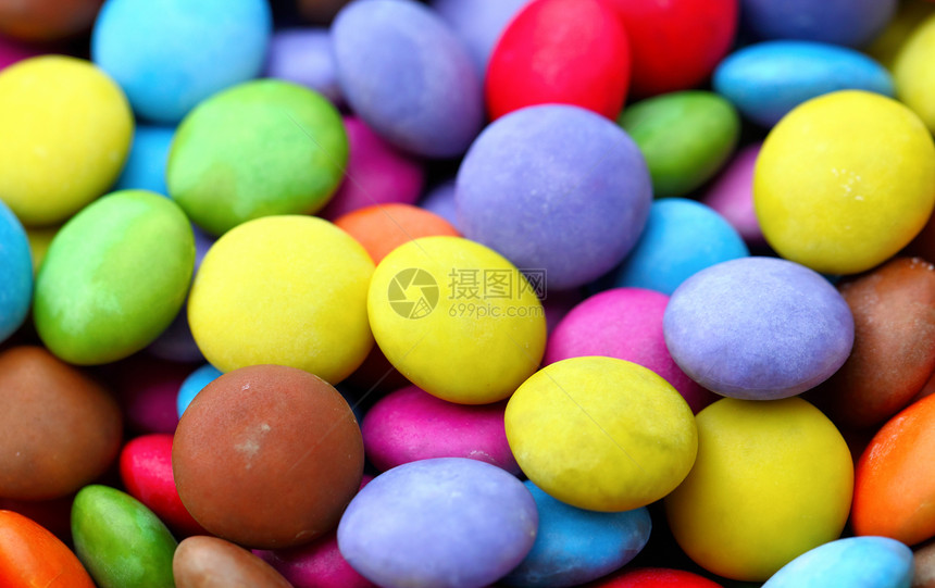 彩色糖果巧克力小吃白色着色剂中毒玩具黄色食物团体活力图片