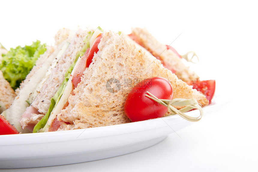 鲜新鲜美味的俱乐部三明治 加沙拉和吐司营养黄瓜熏肉蔬菜早餐火鸡小吃食物午餐饮食图片