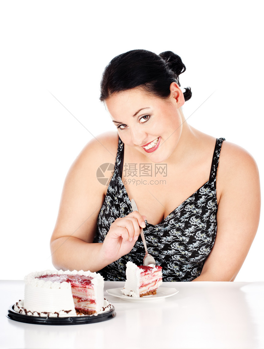 蛋糕和胖胖女人的切片图片