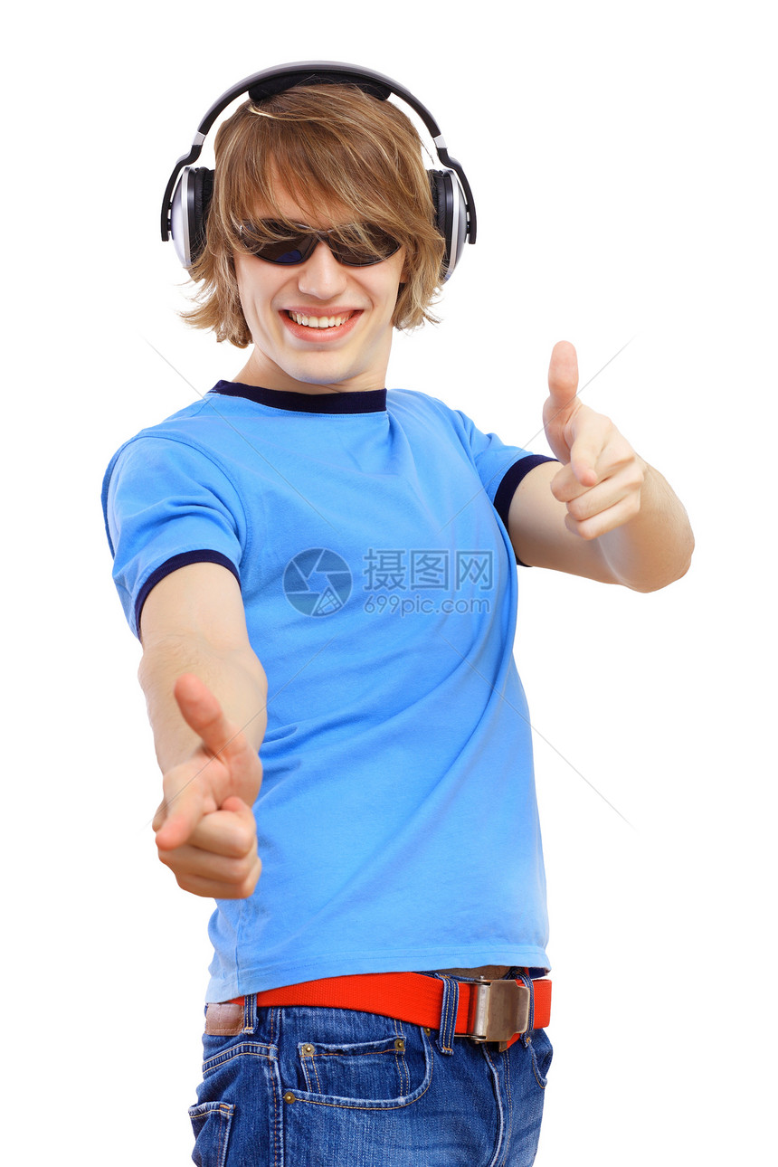 快乐微笑的年轻男子舞蹈耳机娱乐冒充歌曲行动音乐青少年灵活性有氧运动男人图片