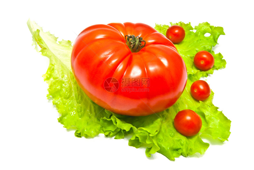 生菜叶上的西红柿图片