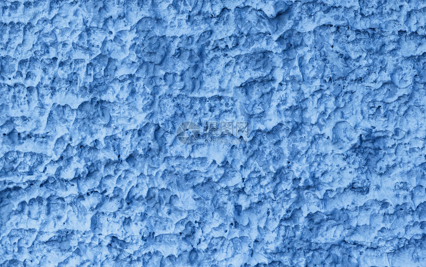 蓝色混凝土墙上的纹理图片