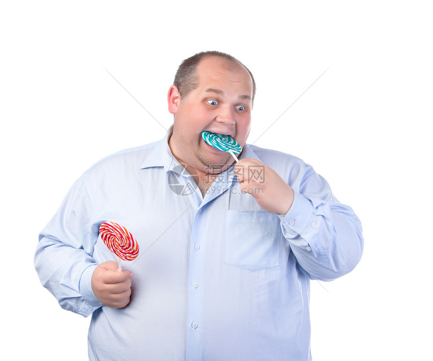 穿蓝衬衫的胖子 吃棒棒糖快乐白色冒充男性贪婪男人衬衫成年人工作室胡子图片