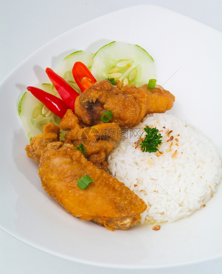 鸡肉加大米和蔬菜食物午餐装饰品饮食土豆萝卜烹饪传统猪肉餐厅图片