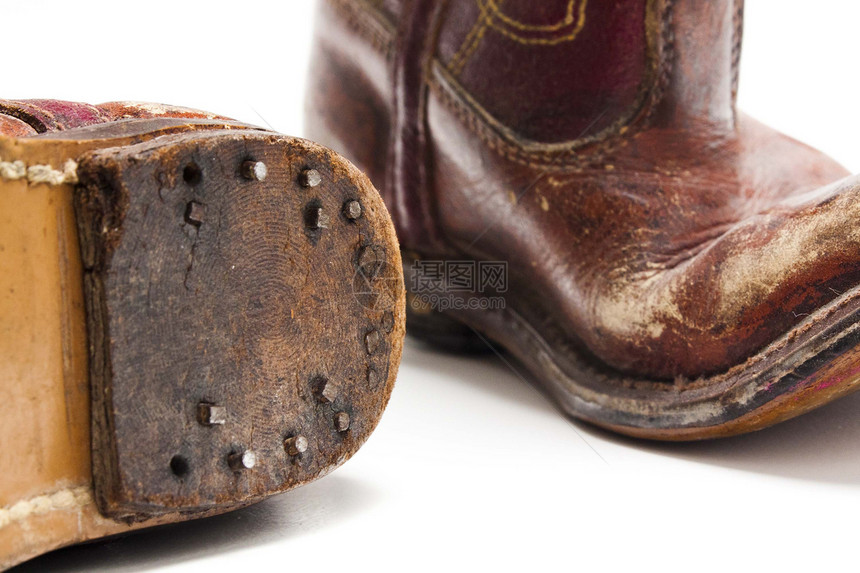年轻年份的靴子童年牛仔古董表演棕色鞋类皮革图片