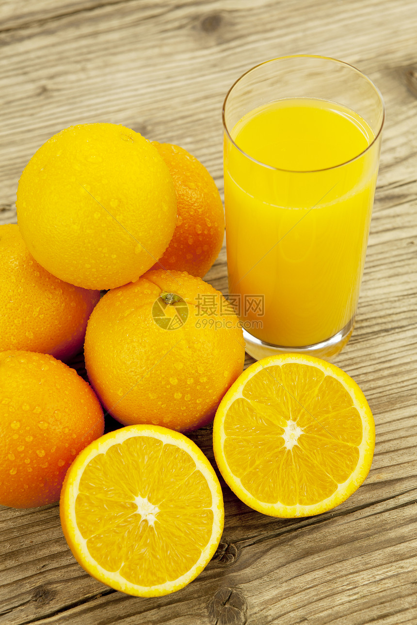 新鲜又健康 美味的橙汁放在桌上饮料热带甜点茶点果汁宏观液体飞溅橙子食物图片
