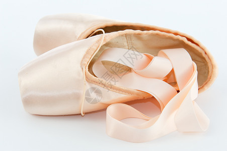 芭蕾拖鞋芭蕾点鞋或滑鼠粉色白色丝带鞋带拖鞋舞蹈背景