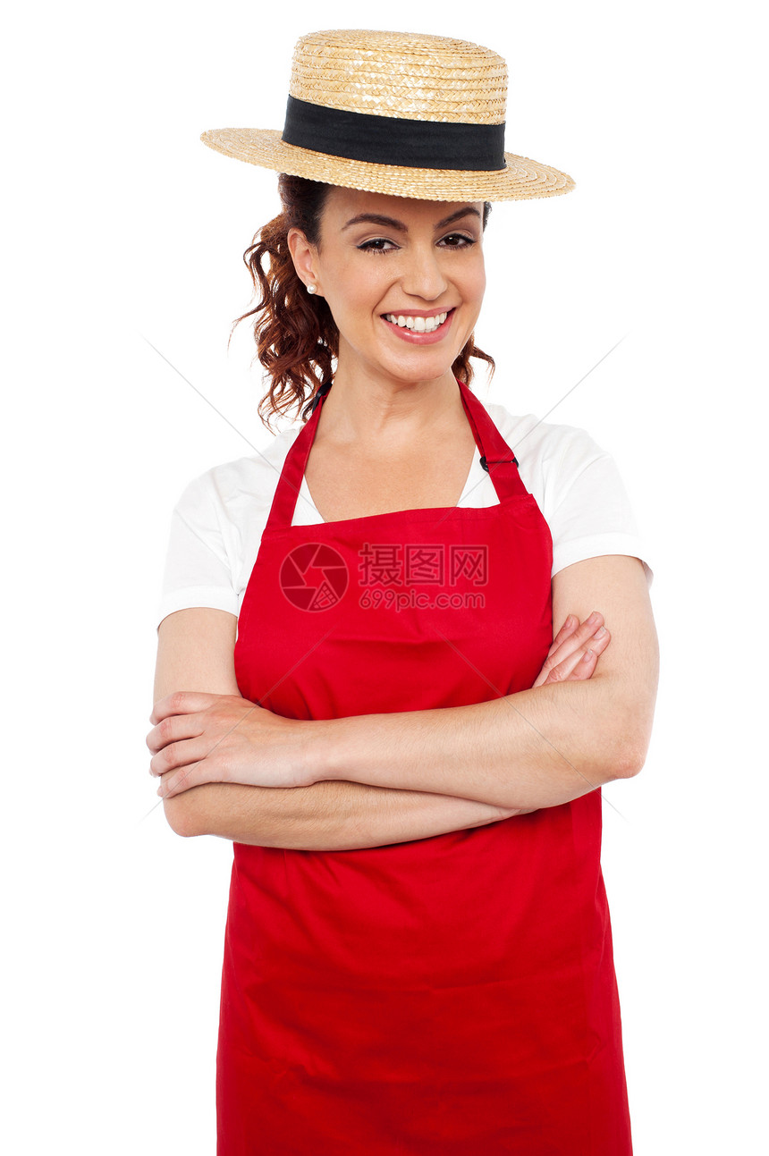 身戴草头保龄球帽的年轻面包师女青年面包女性帽子围裙餐厅服务厨房工作餐饮厨师图片