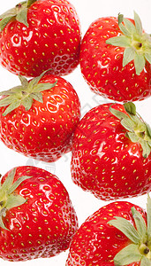 绿叶草莓绿色甜点种子饮食食物水果红色叶子背景图片