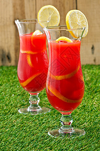 冷冻橙色柠檬桑格里亚派对茶点橙子庆典热带水果冰块水壶酒吧水瓶背景图片