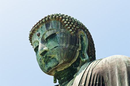 幸德院佛卡马库拉的佛祖地标大佛宗教金属青铜寺庙雕像天空背景