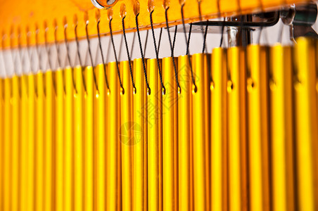 音乐乐器酒吧铃管道木头钟声黄色编钟水平巴铃噪音金子金属背景图片