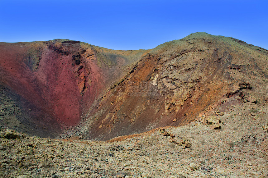 Canaries的火山坑晴天火地自然土地旅行岩石干旱蓝色天空岛屿图片