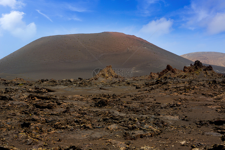 火灾山火山熔岩土地火山旅行公园晴天蓝色岛屿天空假期干旱图片
