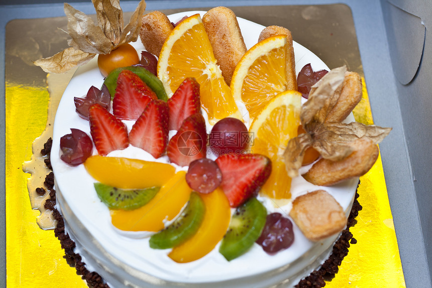 水果蛋糕白色糕点甜点红色庆典派对奶油美食生日橙子图片