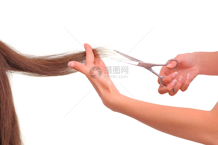 切割年轻女性的理发师职业工具头发剪发微调器棕色工作美容师造型沙龙图片