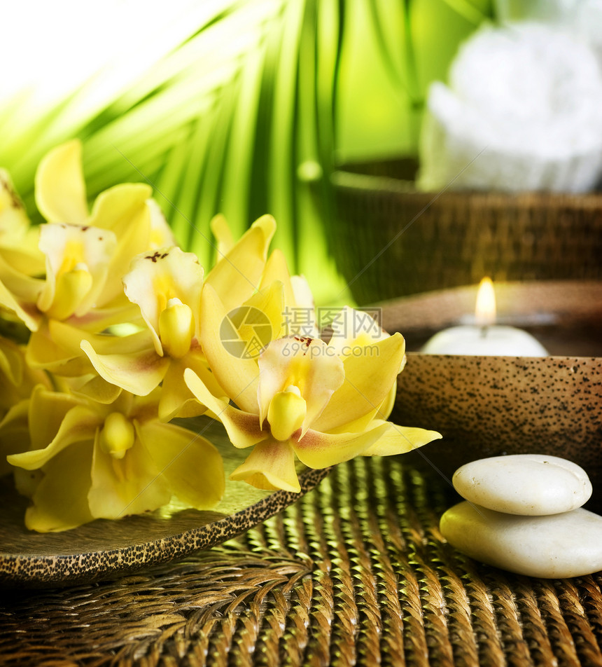 Spa 治疗卫生温泉洗澡化妆品护理芳香花朵兰花蜡烛棕榈图片