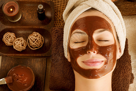 巧克力面膜巧克力面罩面膜面具水疗液体女孩呵护肤色疗法护理皱纹身体背景
