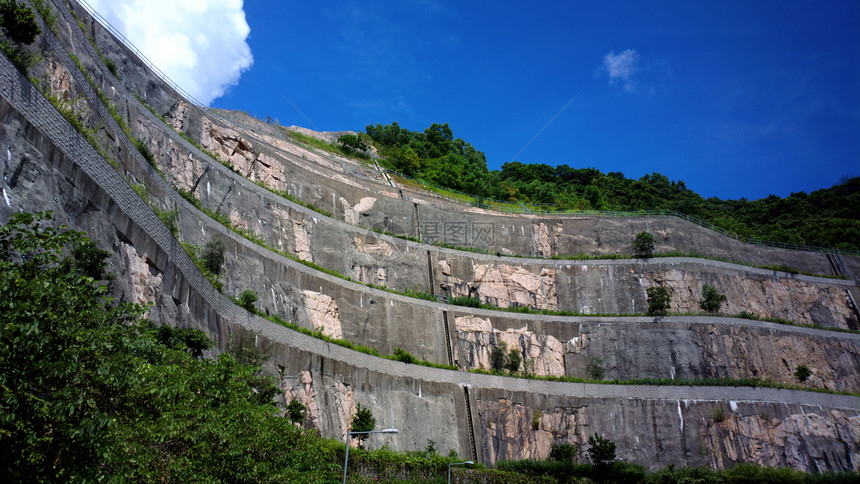 保留墙壁石头植物花园街道岩石叶子园艺风景人行道绿色图片