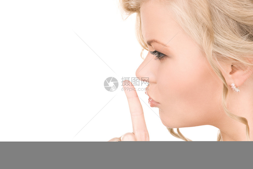 嘴唇上的手指手势女性秘密成人女孩阴谋白色金发女郎图片